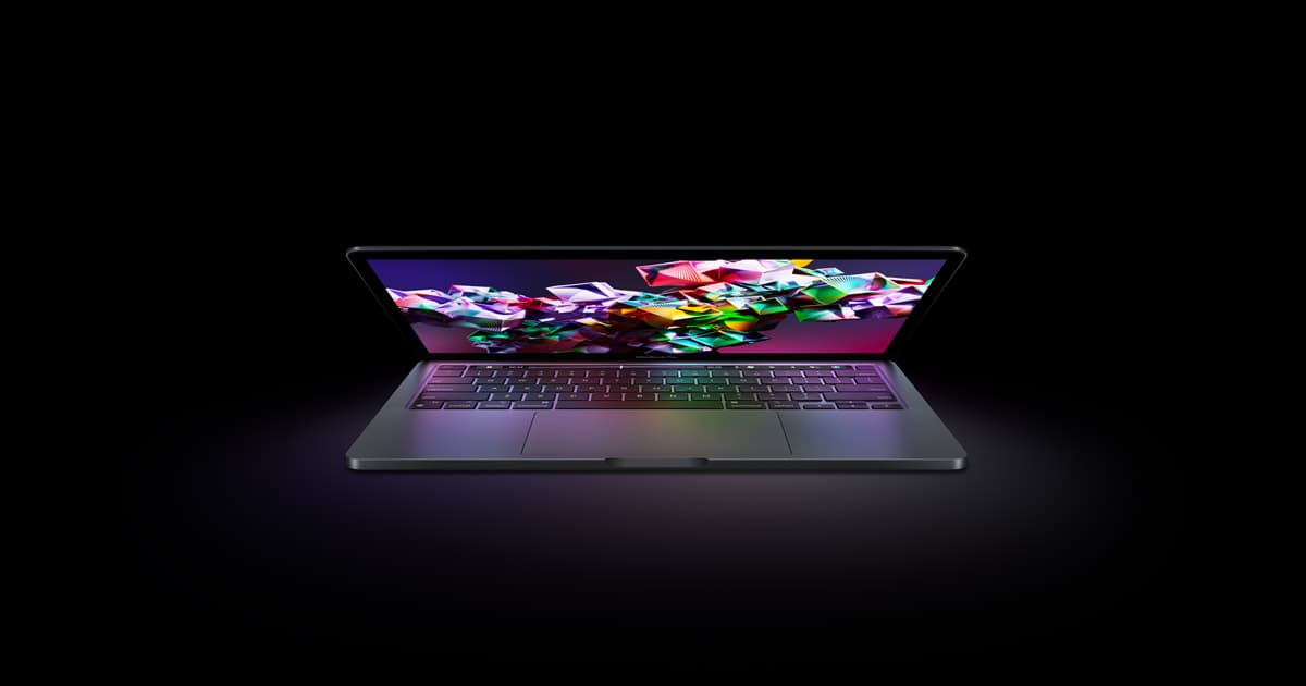 An Apple MacBook laptop viewed from the front with its screen open