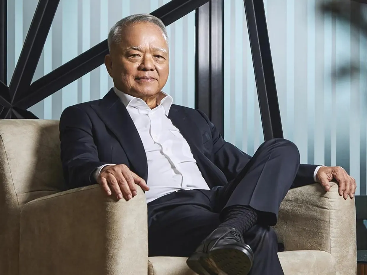 Carabao Group cofounder Sathien Sathientham seated in an armchair
