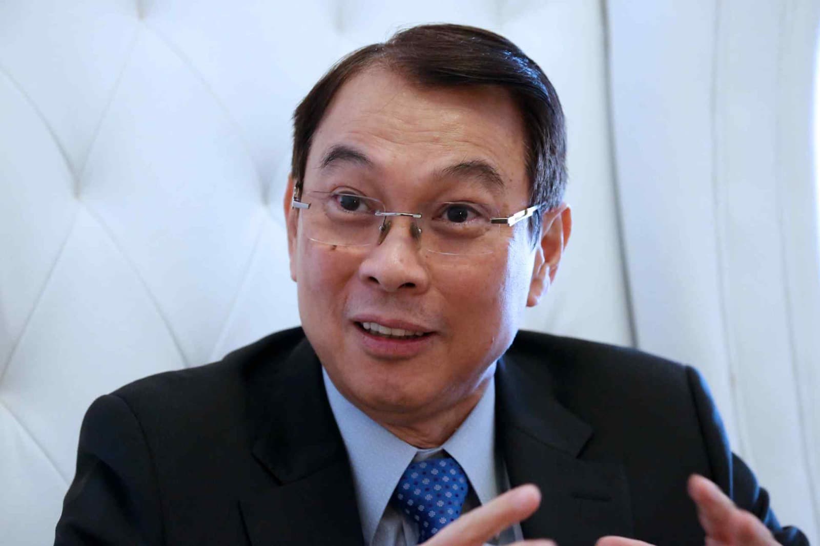 Jollibee founder and Hotel101 backer Tony Tan Caktiong speaks during an interview