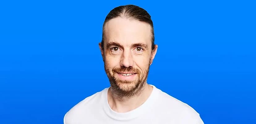Mike Cannon-Brookes, chief executive and co-founder of Atlassian, in a headshot against a blue background